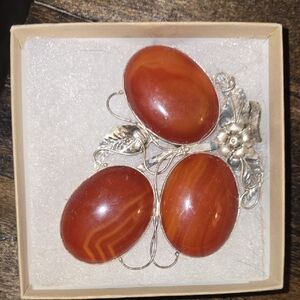 Elegant Silver and Brown Brooch